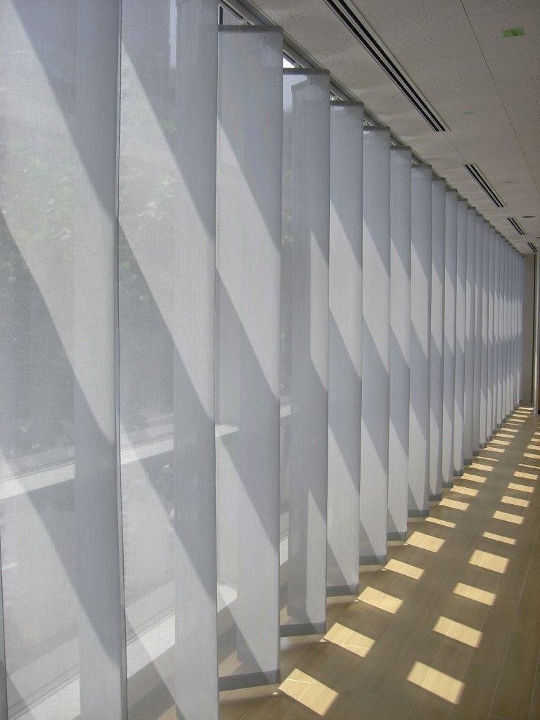 Panel blinds in Dubai commercial space as room divider